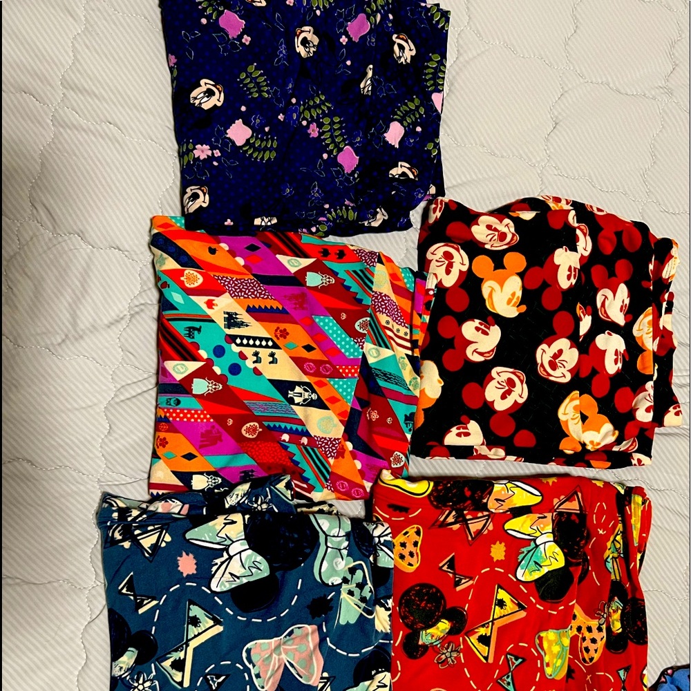 5 new Lularoe Disney maybe worn 1 time no piling Tall And curvy